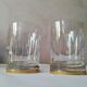 4 crystal whiskey glasses on gold frame