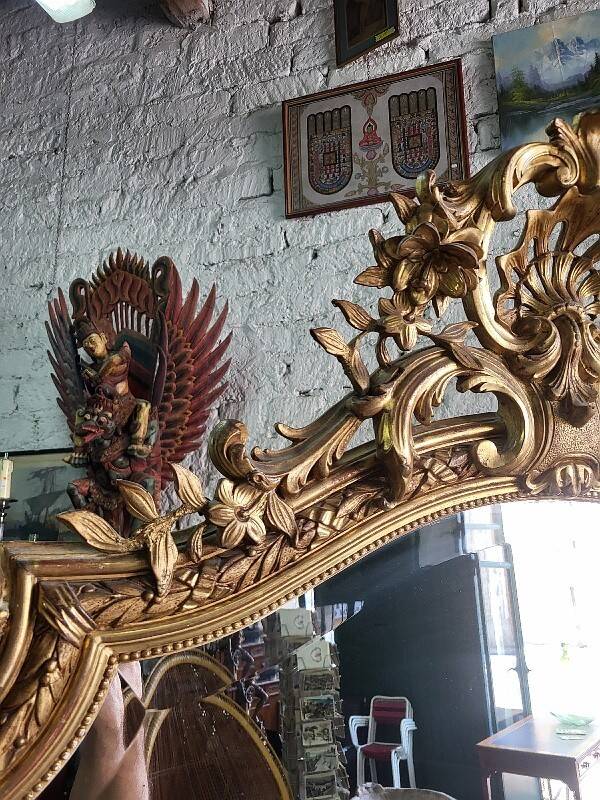 Large Louis XV gilded shell mirror from the 19th century