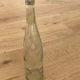 Bottle engraved pears