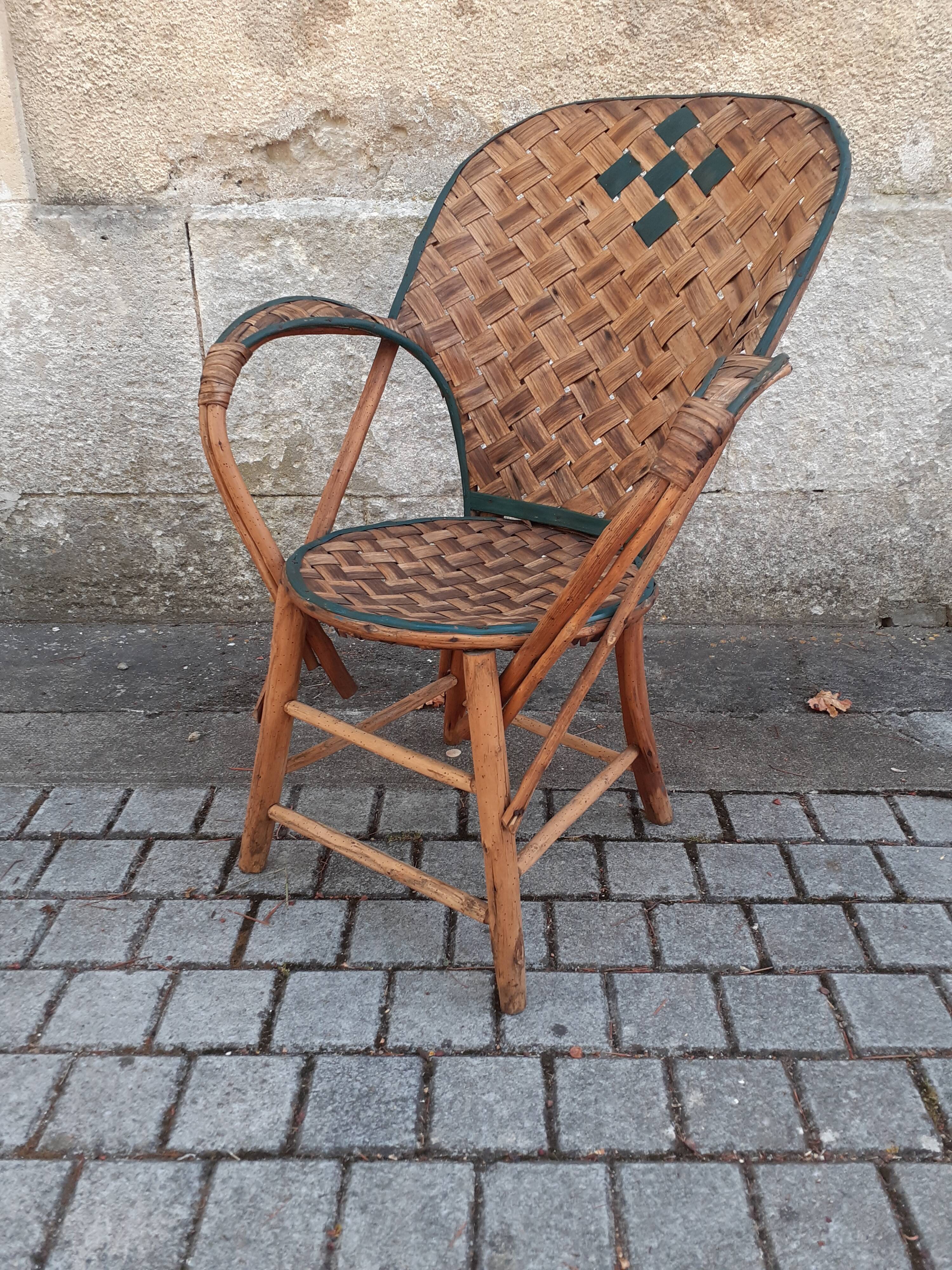 Vintage armchair in braided chestnut leaves, 1940s