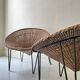 Italian sunflowers armchair in rattan and black metal, 1950s design.