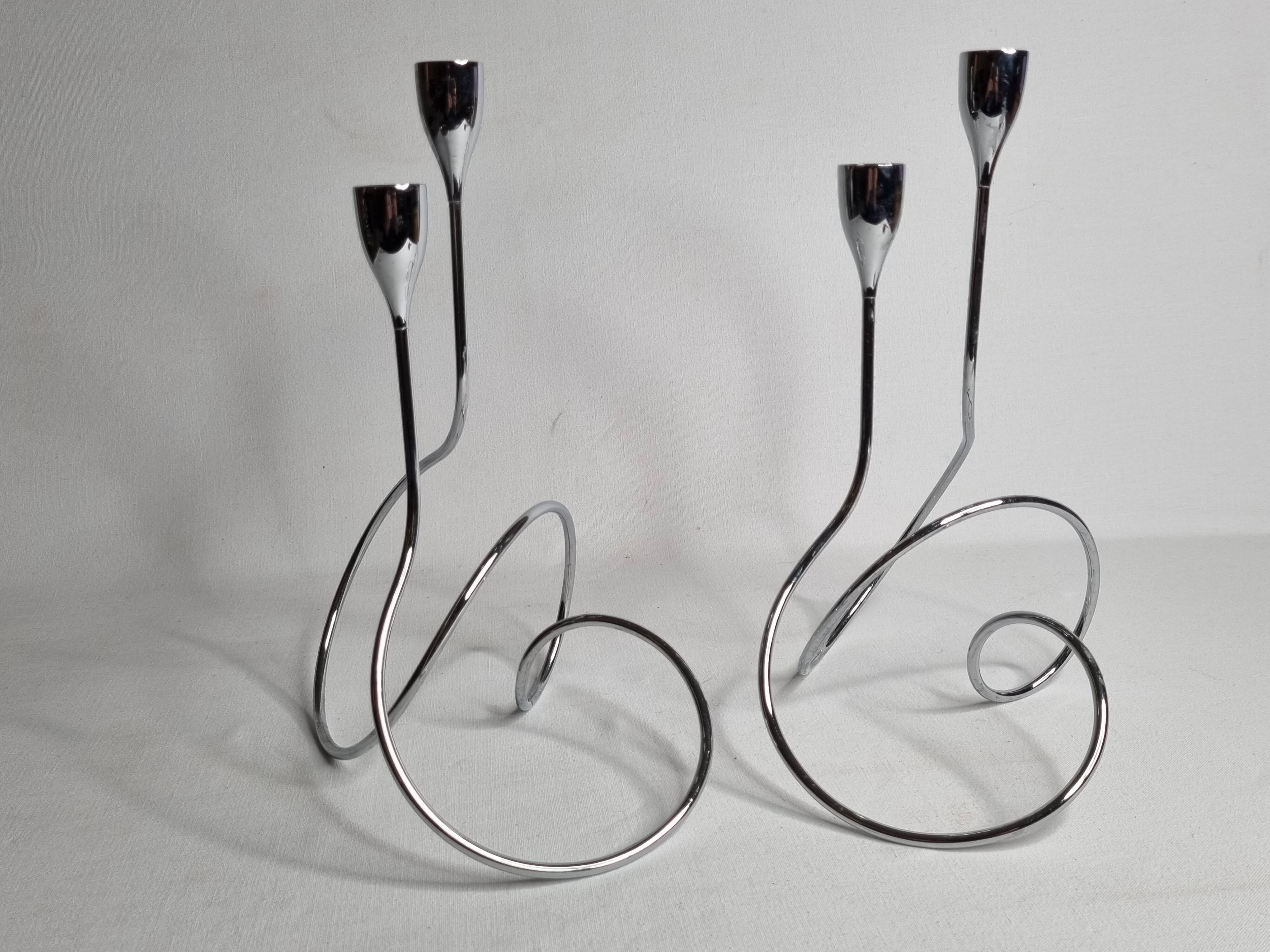 Pair of “Black & Blum” designer candlesticks in chrome-plated metal, 27 cm