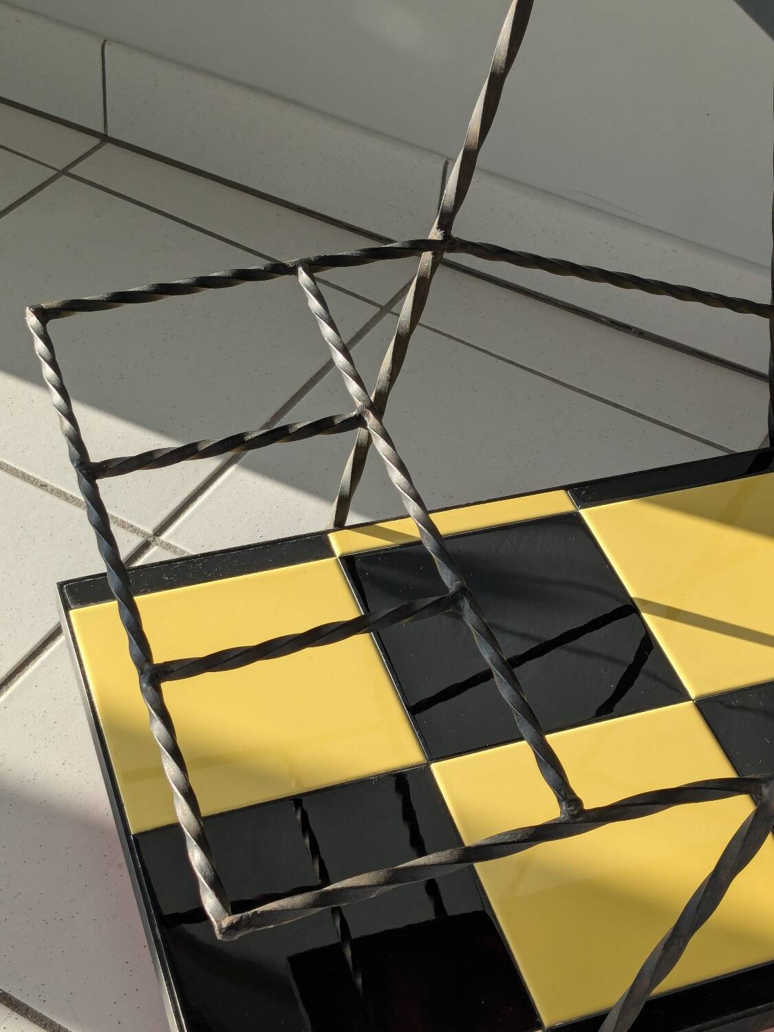 Vintage black and yellow checkered rolling bar trolley