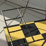 Vintage black and yellow checkered rolling bar trolley