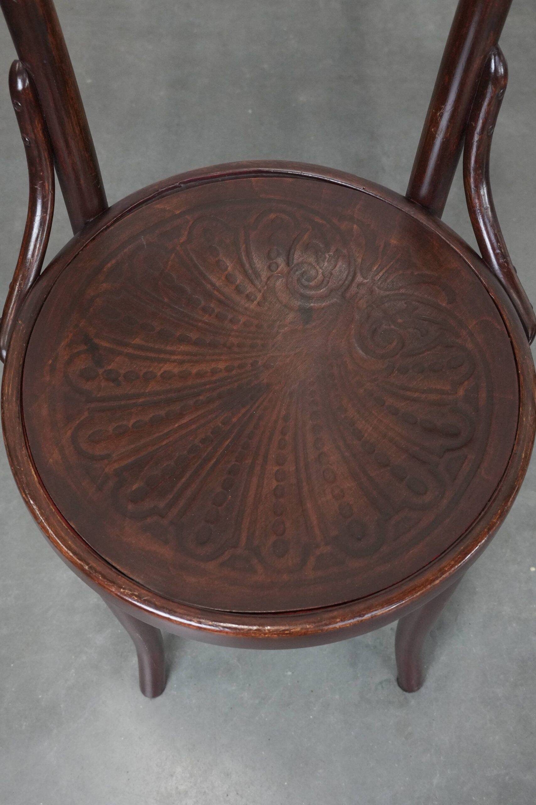 Set of five vintage wooden Cosmos bistro design chairs with stunning detail