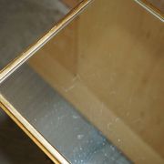 Italian vintage console with a glass mirror top.