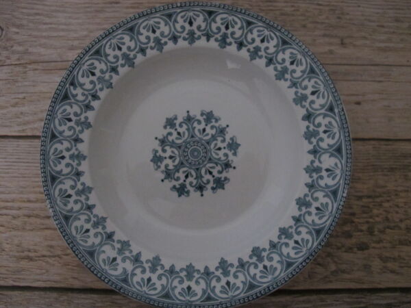 5 assiettes creuses en terre de fer de Badonviller