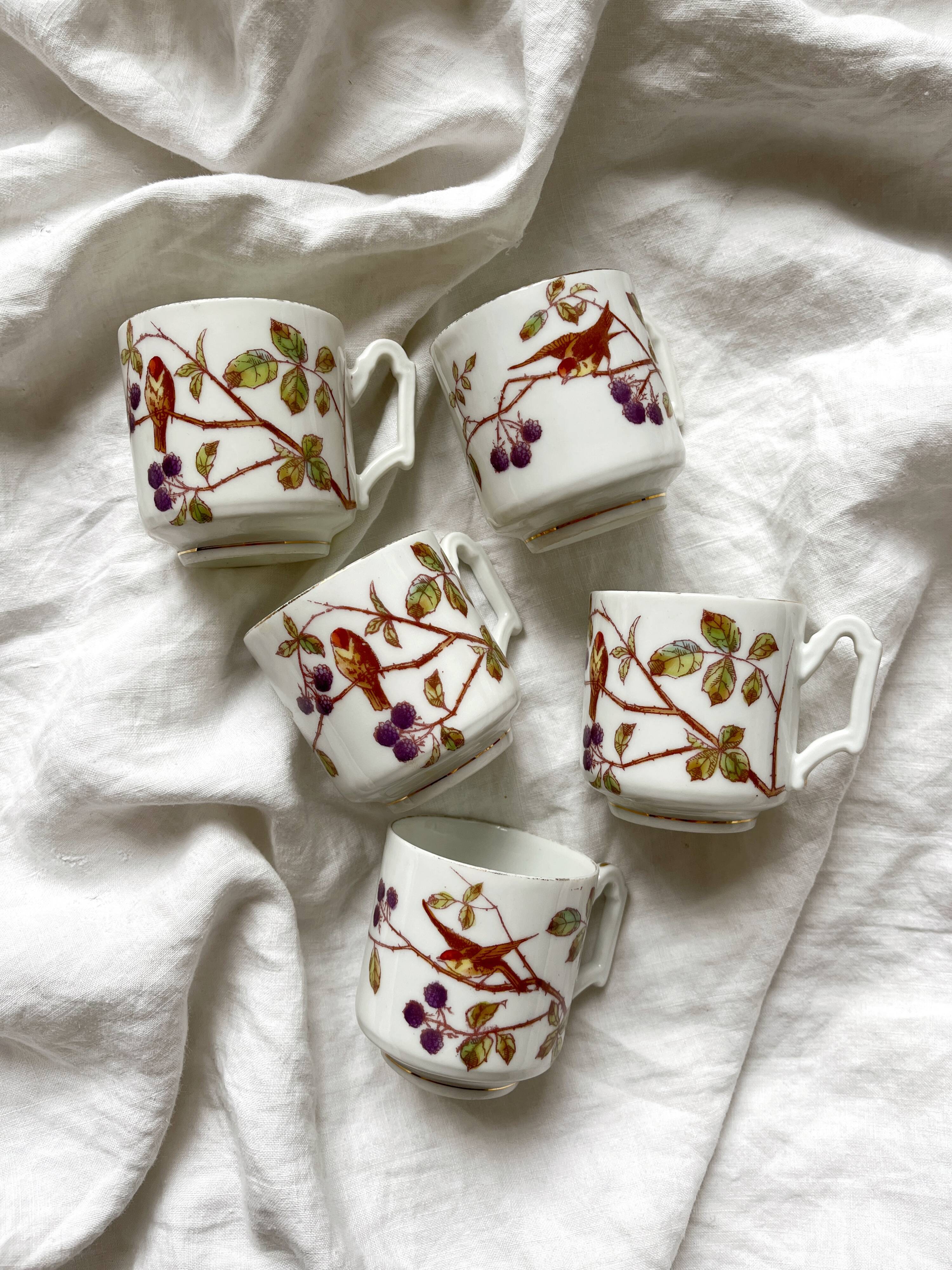 5 antique porcelain coffee cups decorated with birds