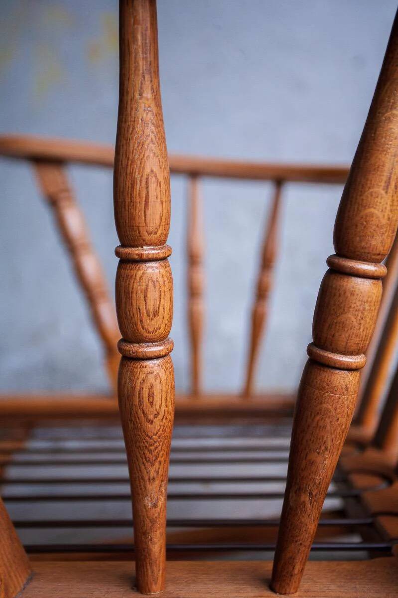 Set of 2 oak armchairs in mid-century style, covered in a blue-green checked fabric.