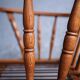 Set of 2 oak armchairs in mid-century style, covered in a blue-green checked fabric.