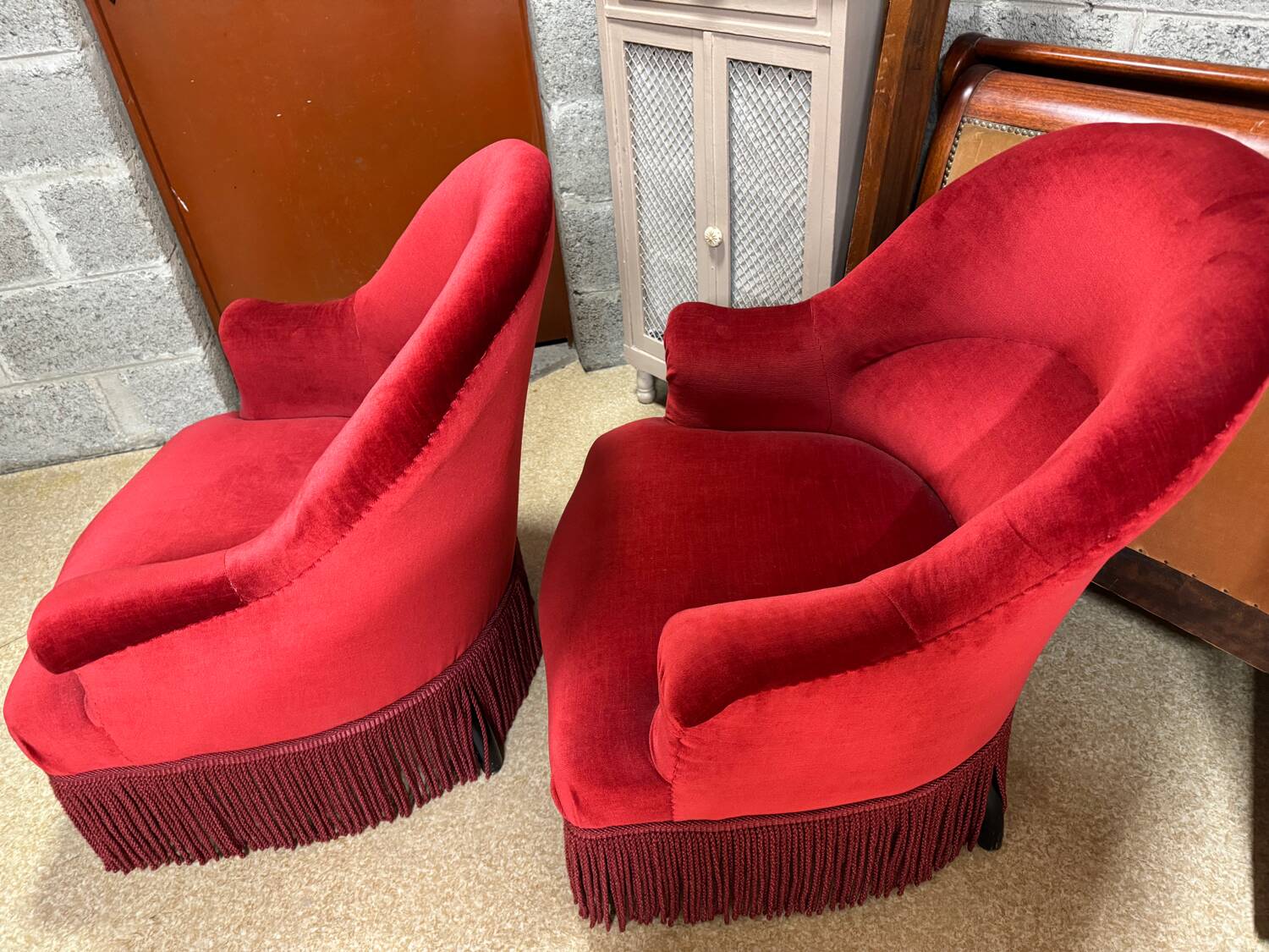 Pair of red toad theater armchairs