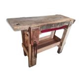 Old homemade vintage solid wood workbench with press and drawer