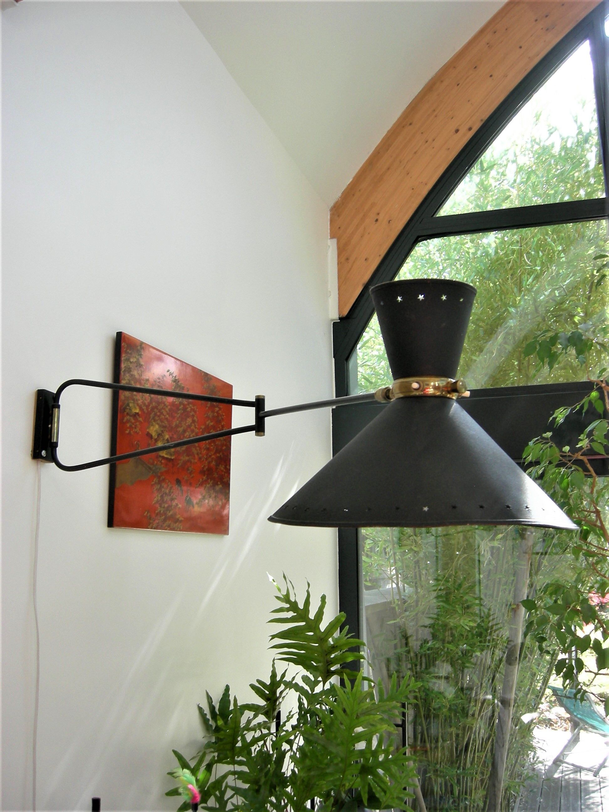 Roger Mathieu's diabolo sconce for Lunel with double lighting