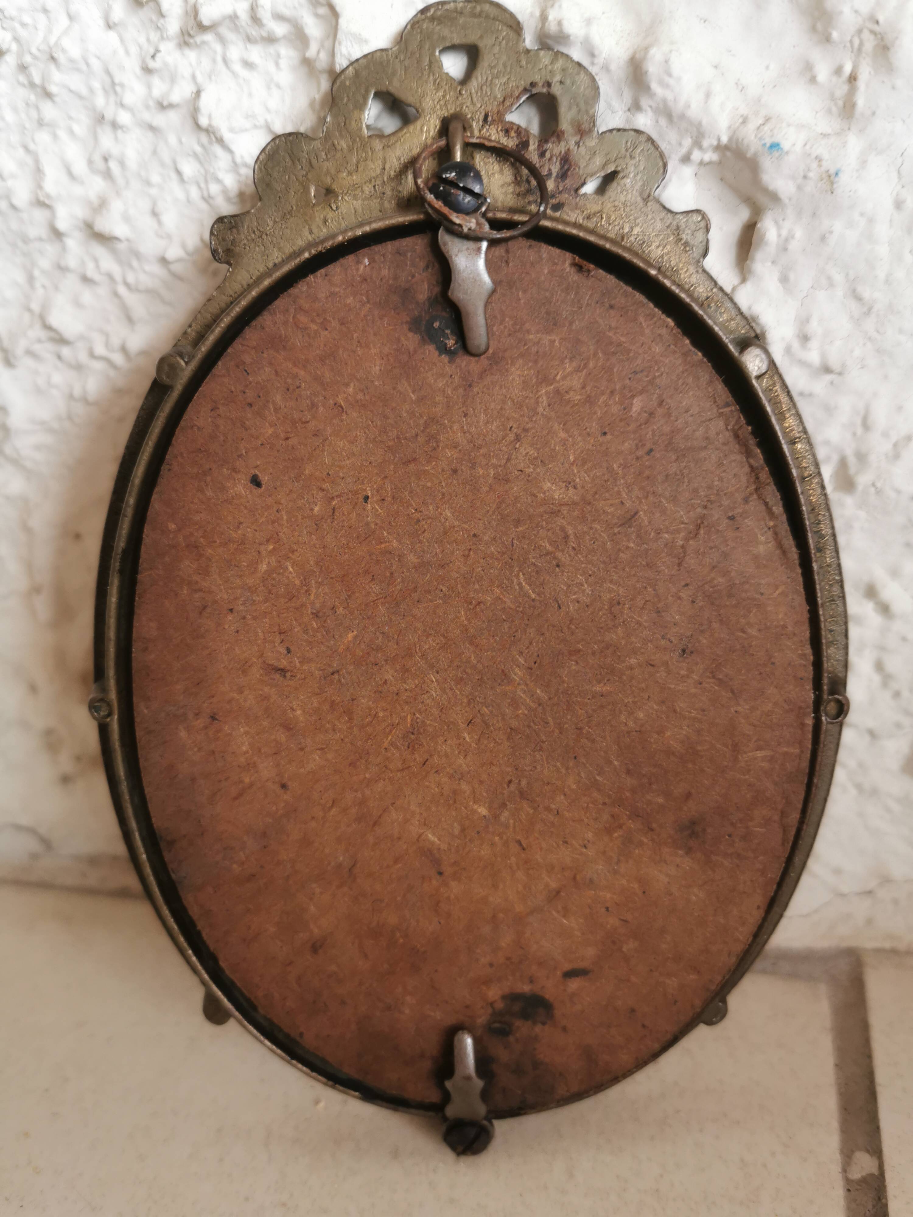 Former Louis XV-style brass photo frame