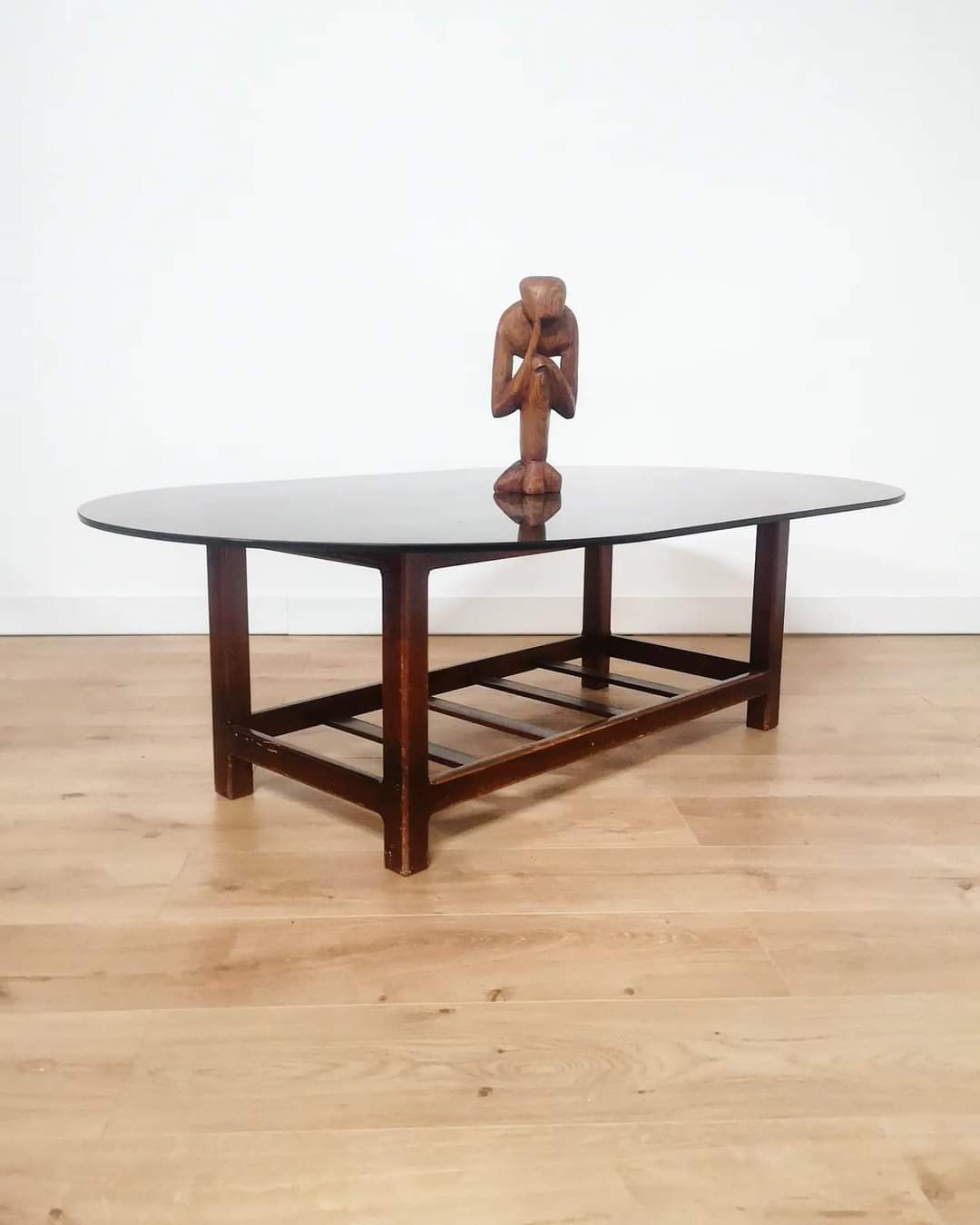 Scandinavian oval smoked glass coffee table