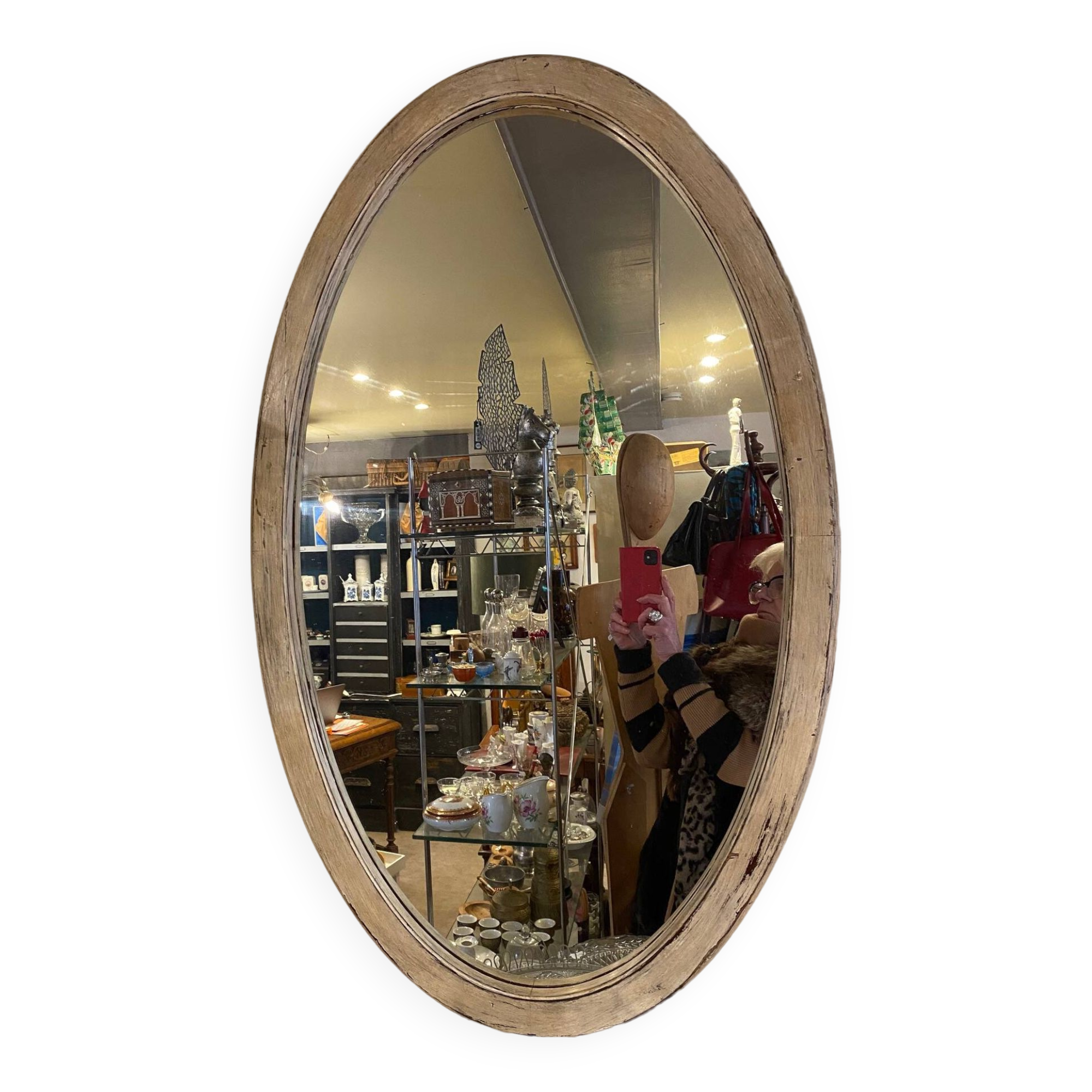 Large old oval mirror with beige patina wooden frame early 20th century