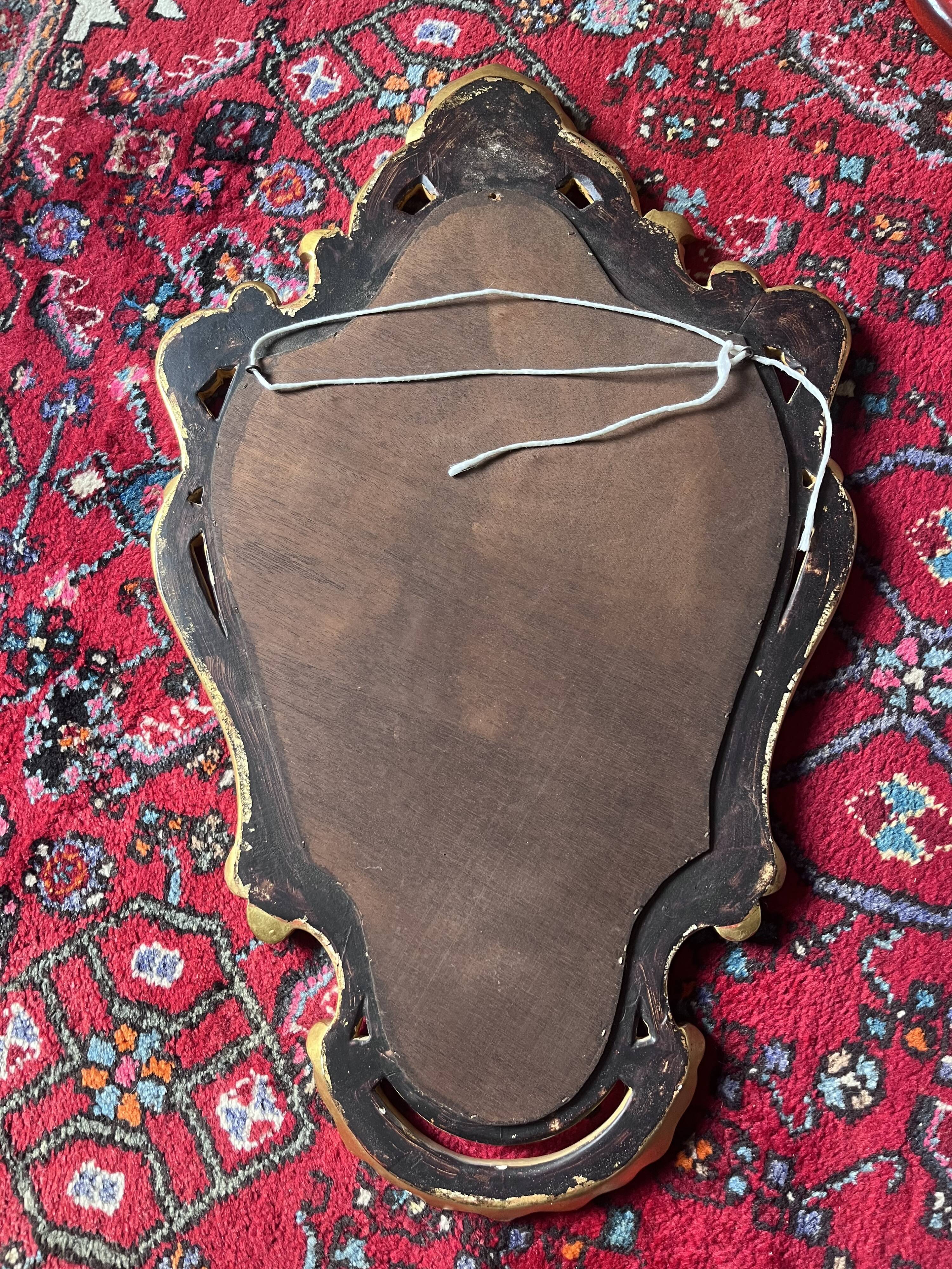 Miroir baroque en bois doré