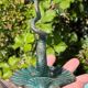 Antique candlestick base – stylised marine fish in patinated bronze