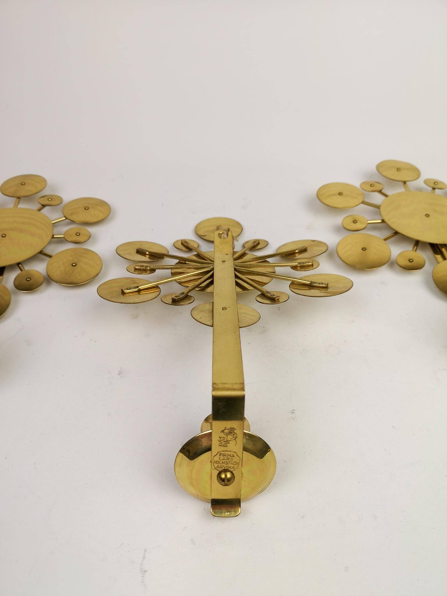 Set of 3 Wall Candle Holders in Brass "Sunburst" Holmström, Arvika, Sweden, 1960s