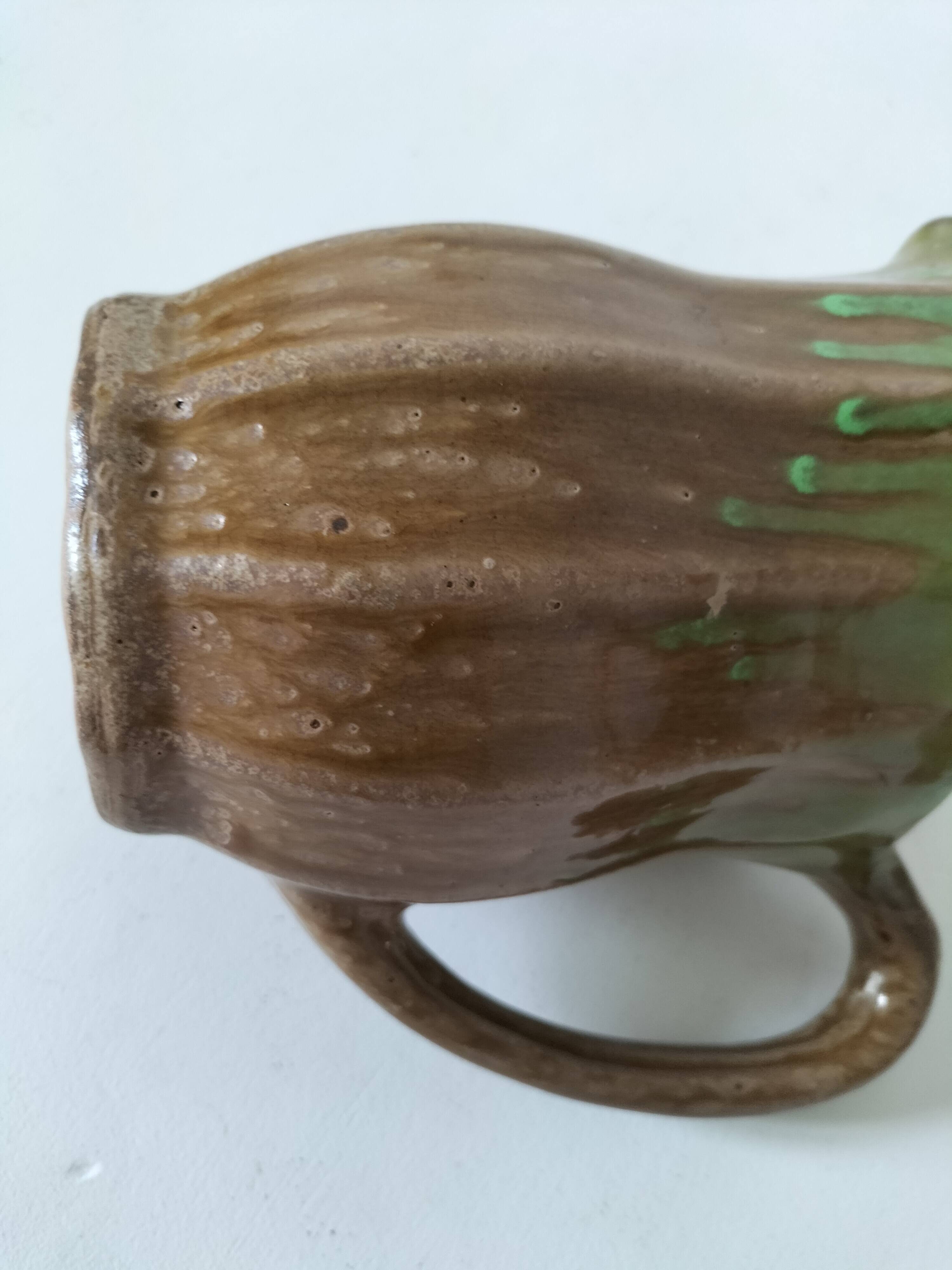 Handcrafted green and brown glazed ceramic pitcher, 1960s-70s