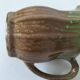 Handcrafted green and brown glazed ceramic pitcher, 1960s-70s