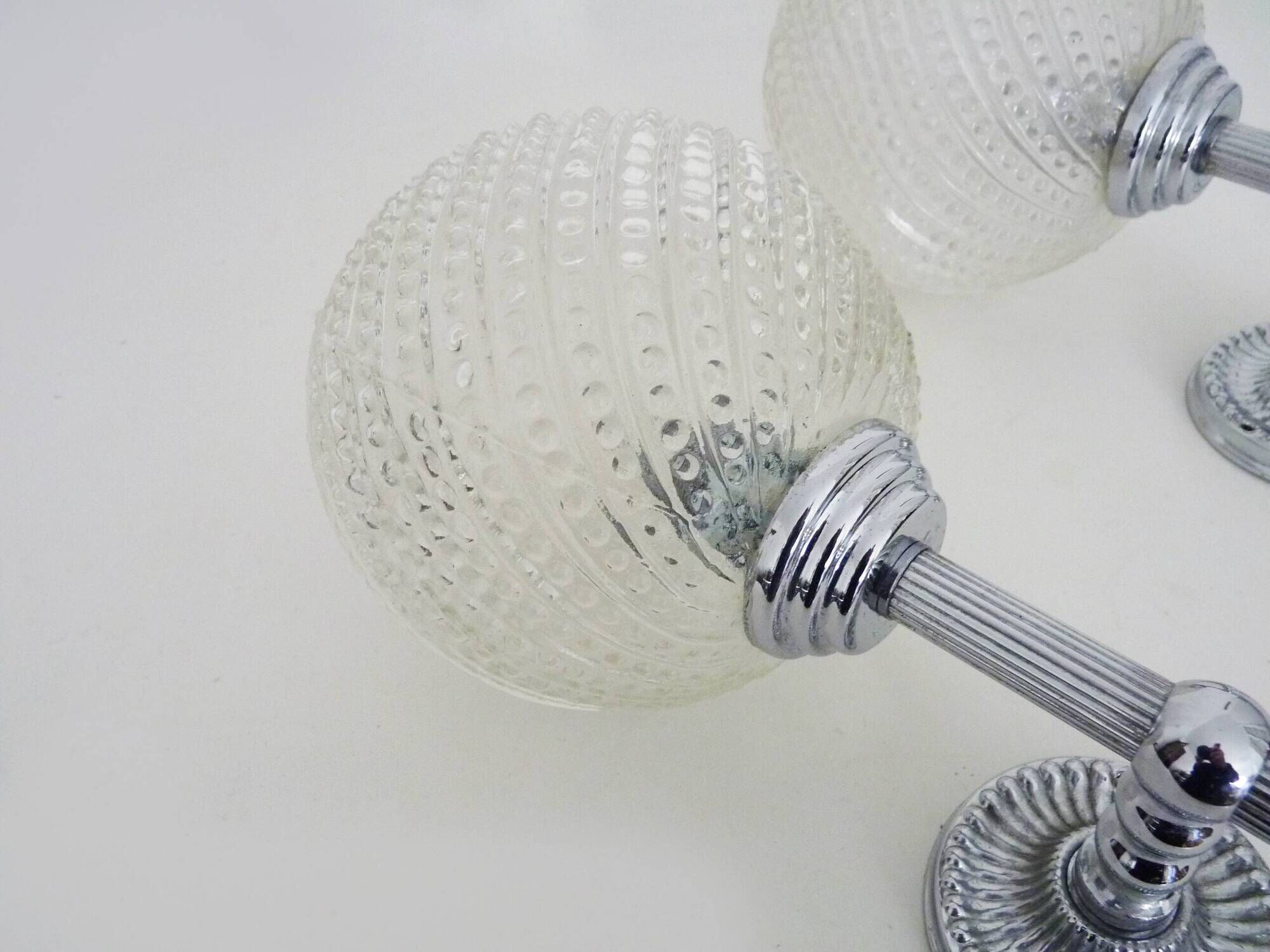 Pair of vintage Karl Lenz wall sconces. Chrome-plated metal and glass