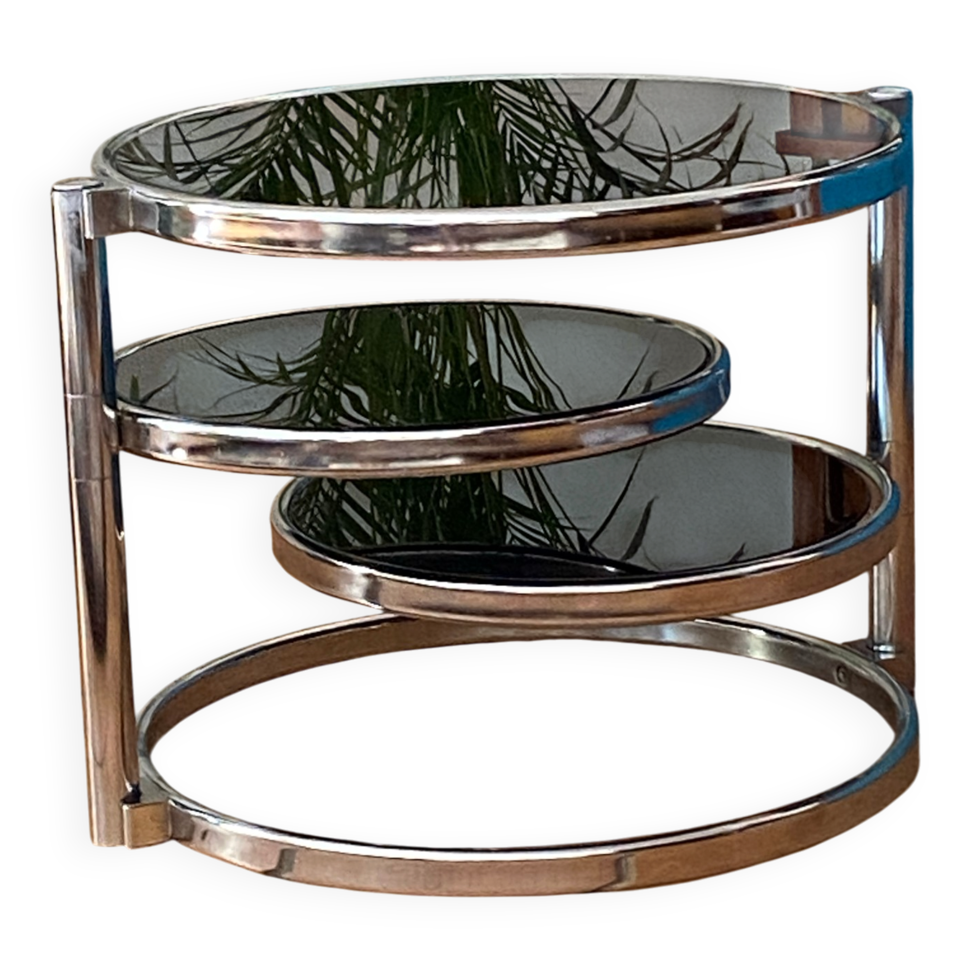 Coffee table with pivoting metal and black glass elements.