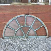 Old wrought iron full riveted gates from the 19th century.