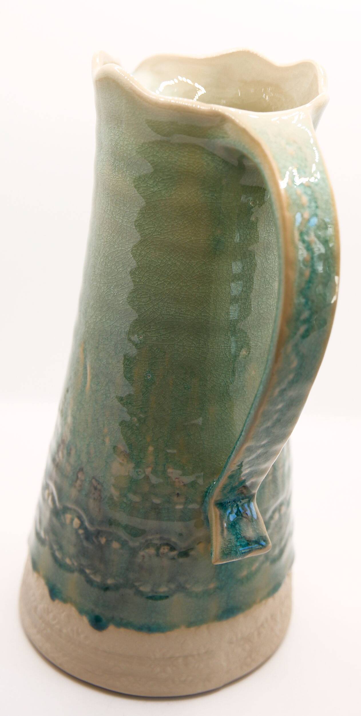 Handcrafted XL pitcher in mint green enameled stoneware