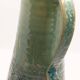 Handcrafted XL pitcher in mint green enameled stoneware