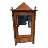 Set consisting of 1 cradle and 1 doll wardrobe