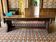 Very large carved wooden table