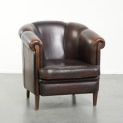 Dark sheepskin club armchair with unique design in English style