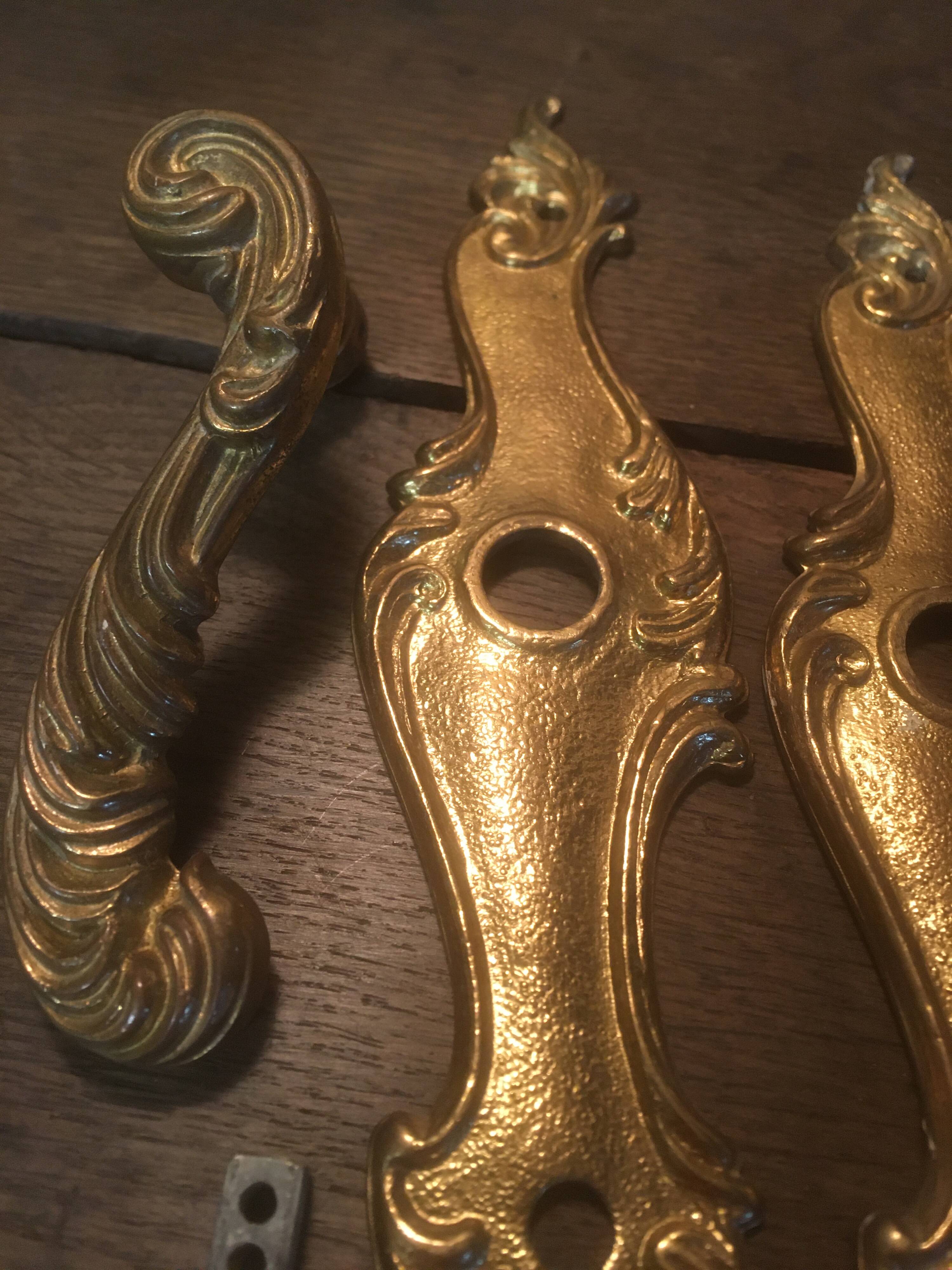 Louis xv style brass crutches and plaques