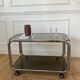 Rolling serving cart in chromed steel and smoked glass, 70s design