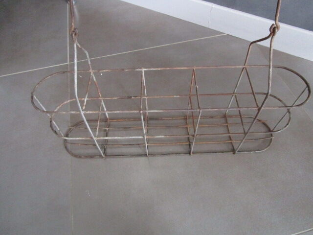 Old metal bottle holder