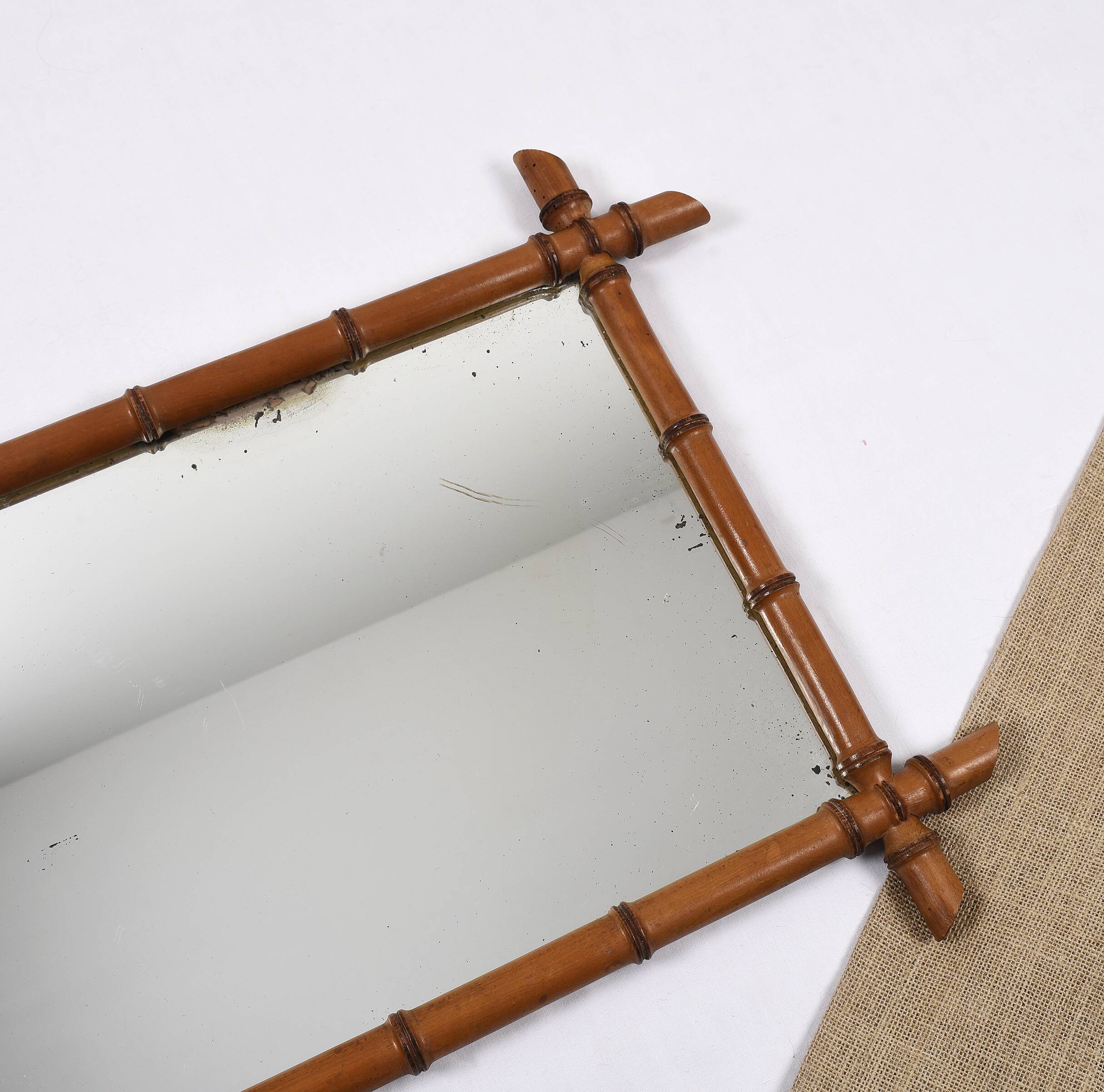 Old turned wooden mirror imitation bamboo