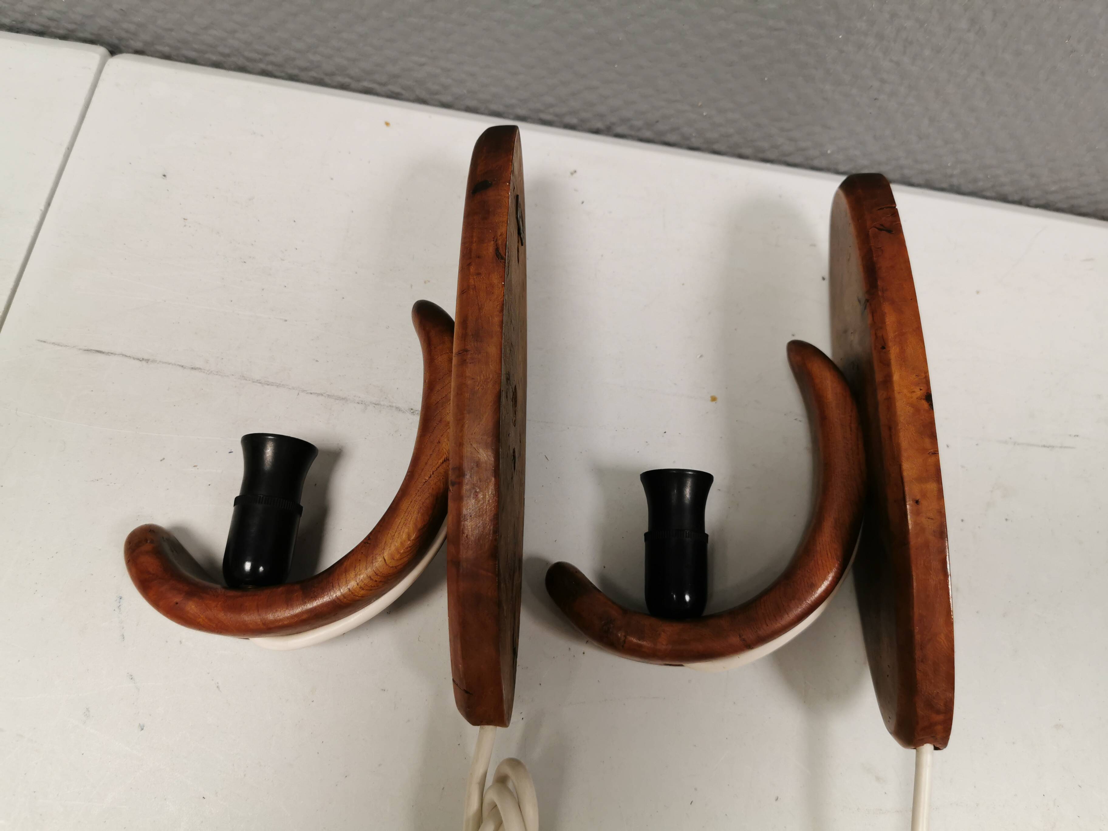 A set of old wall lamps in walnut.