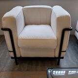 A sofa and two LC2 Cassina armchairs