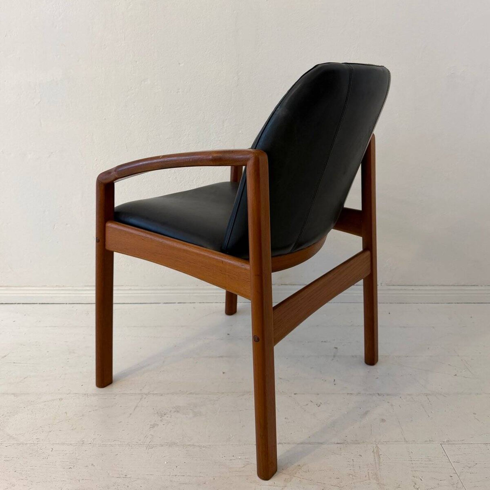 Mid-century modern chair in teak and black leather, Germany, 1960s