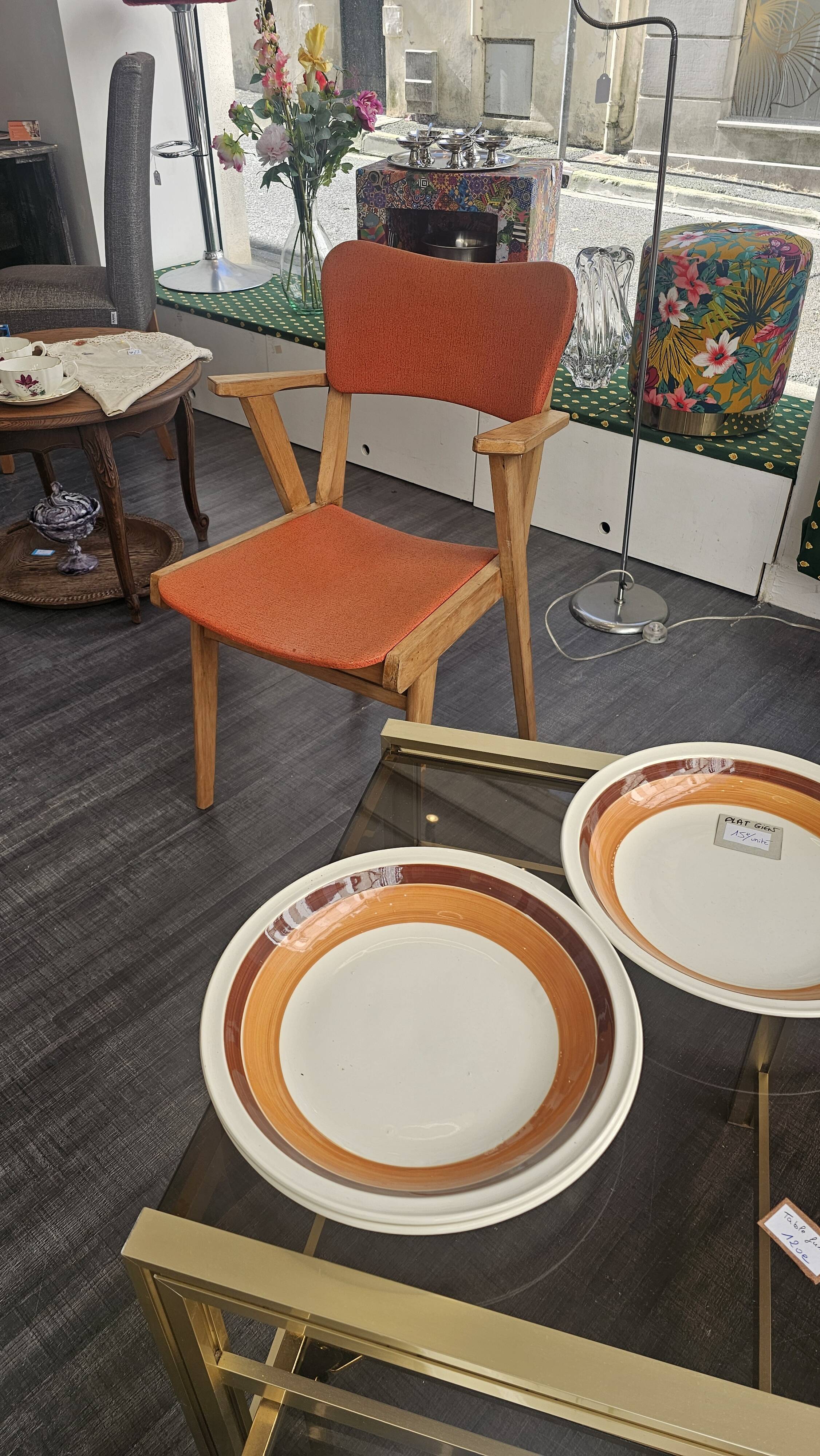Modernist armchair in wood and orange fabric