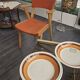 Modernist armchair in wood and orange fabric