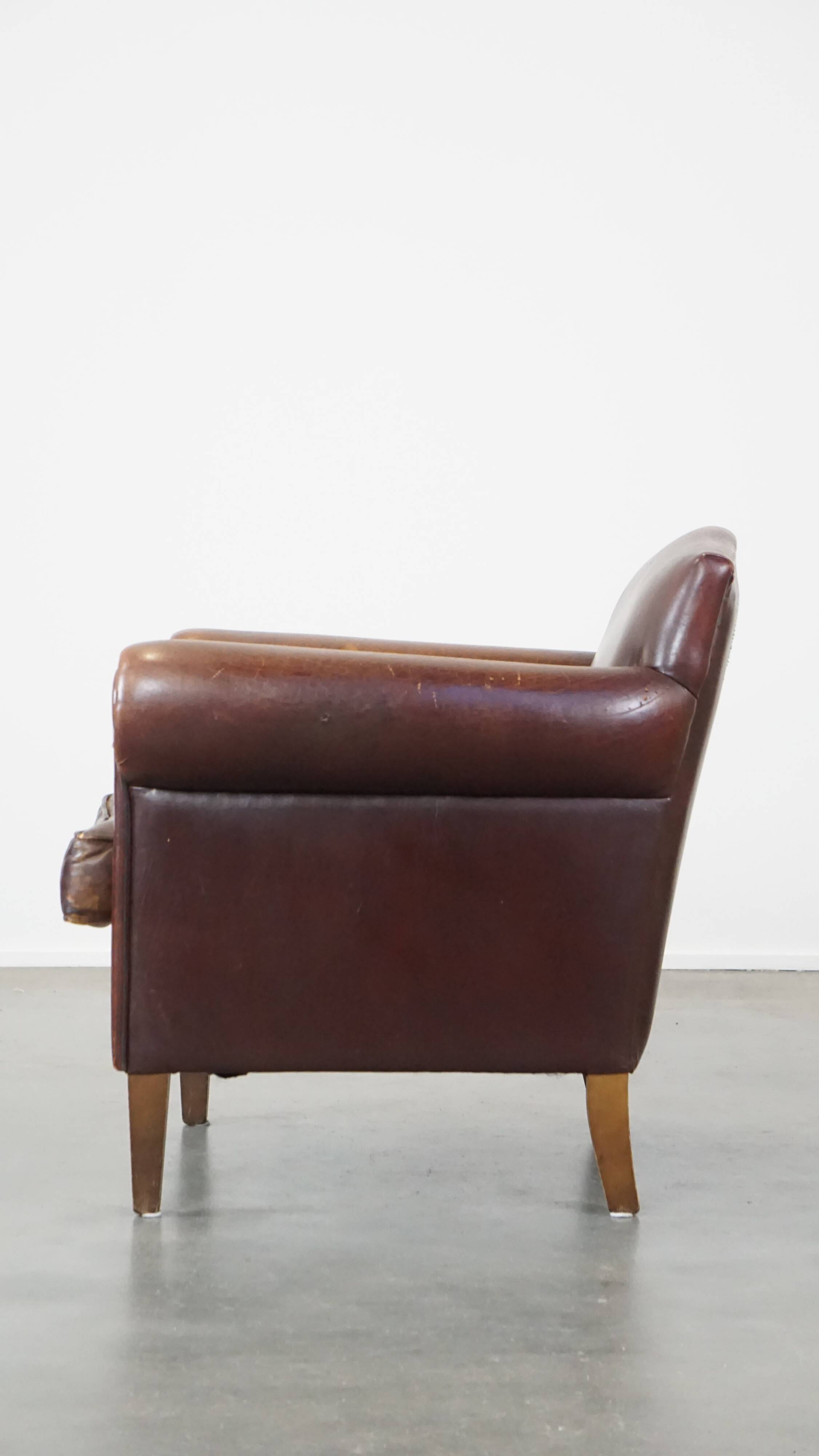 Design armchair made of sheep leather with a clean finish