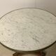 Empire-style tripode healing in mahogany top of marble gallery