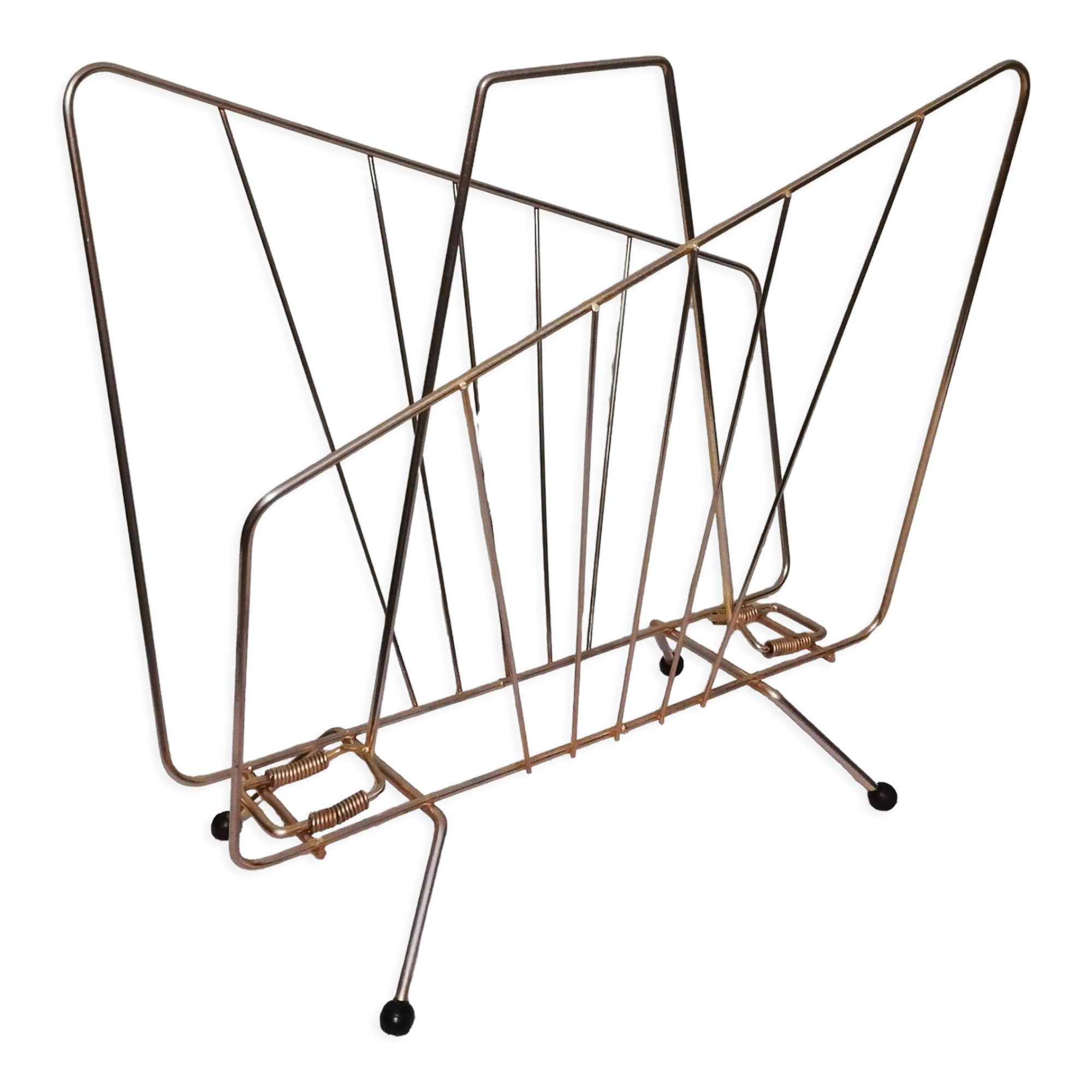 Vintage magazine holder in gilded brass.