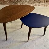 Pair of tripod and nesting coffee tables in walnut and midnight blue