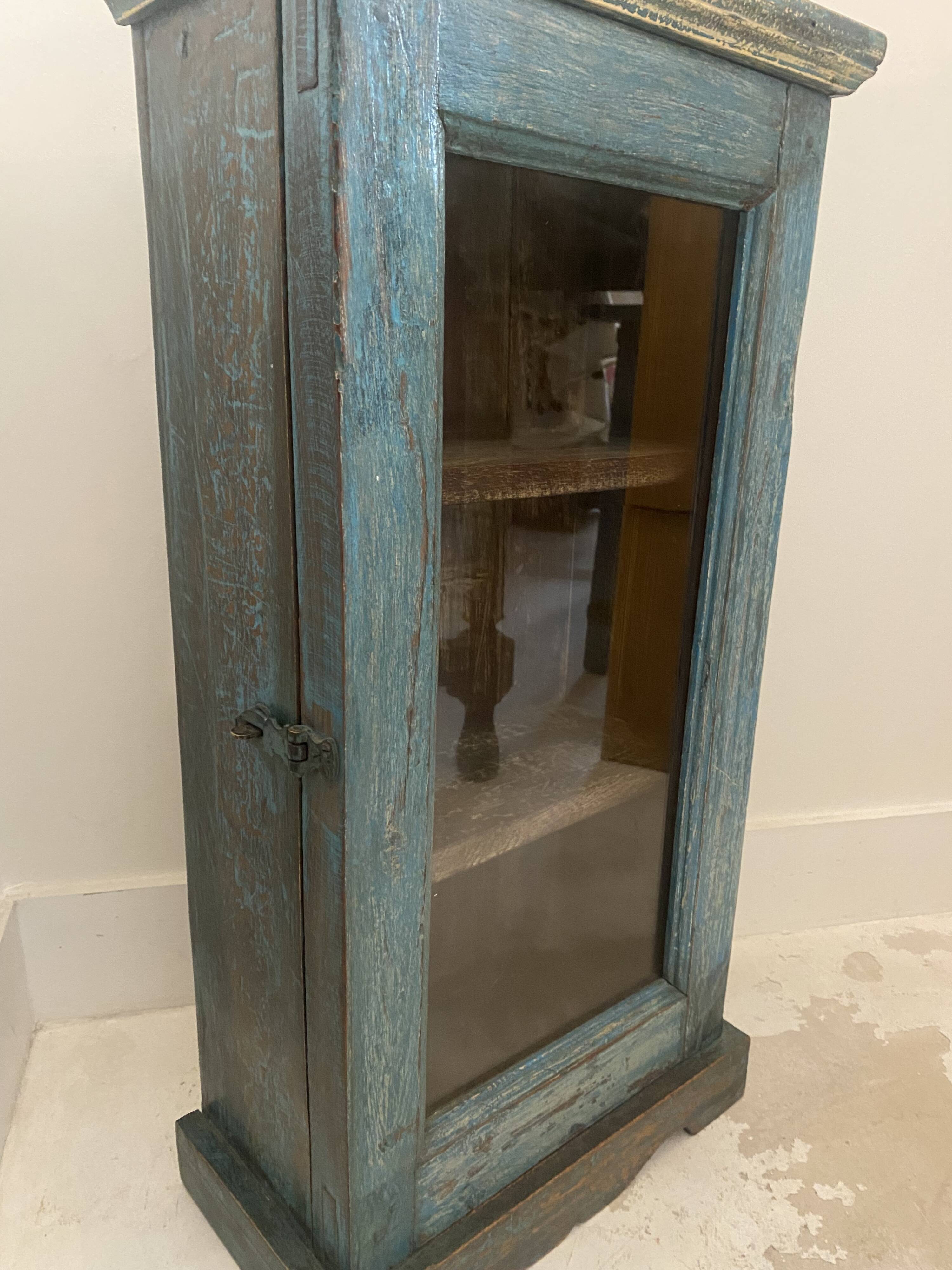 Small wall display case in blue lacquered teak