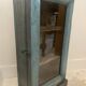 Small wall display case in blue lacquered teak