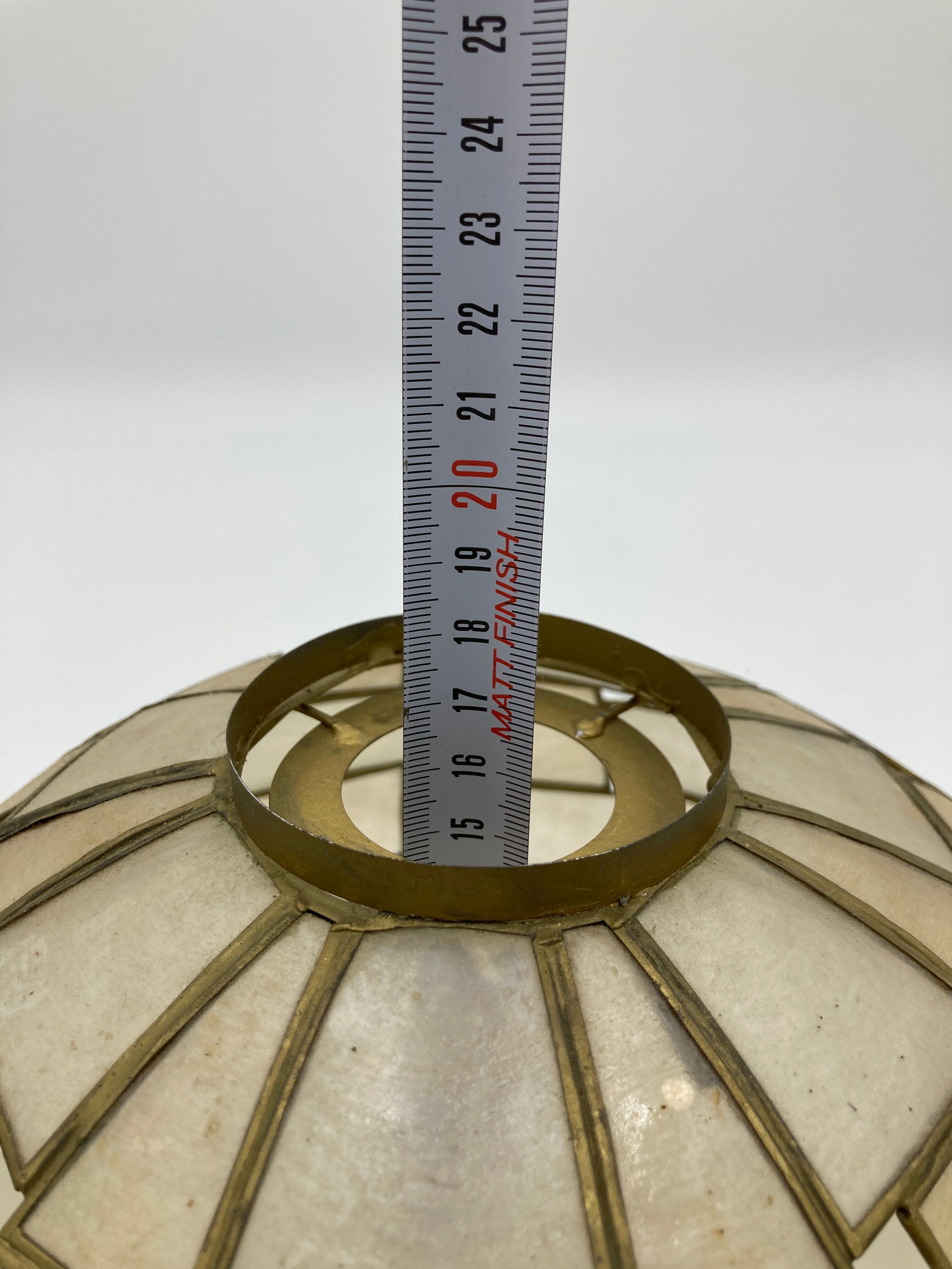Suspension in geometric mother-of-pearl