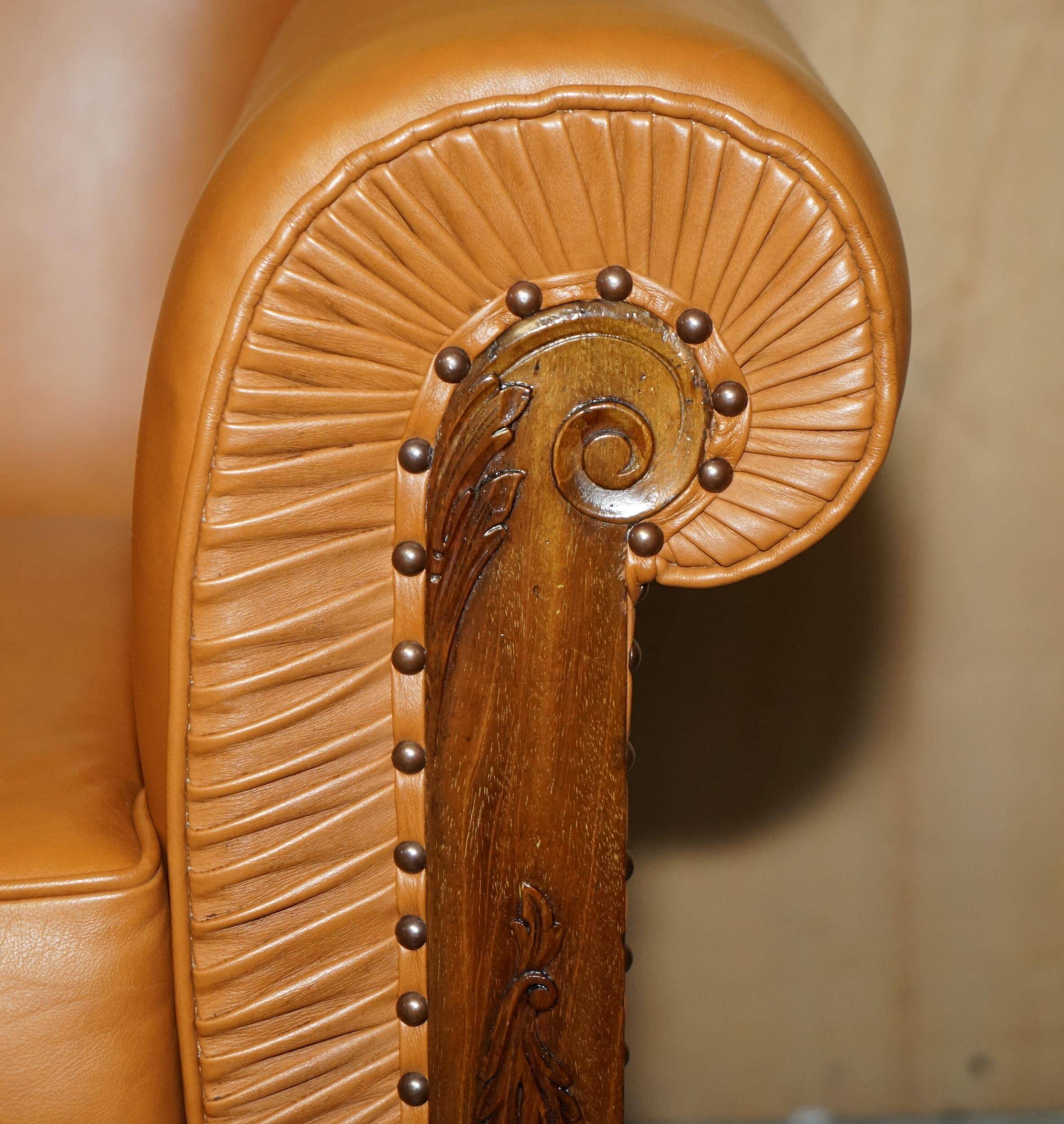 Restored three-seater leather canapé in late Victorian style.